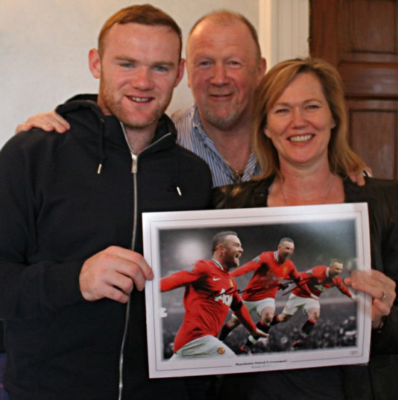 Wayne Rooney with Terry & Freda Baker at a A1 Sporting Speakers exclusive memorabilia signing session in 2012.