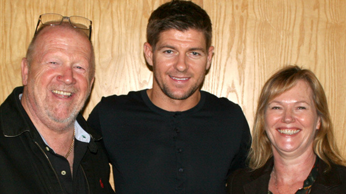 Steven Gerrard alongside Terry and Freda Baker during an exclusive memorabilia signing session